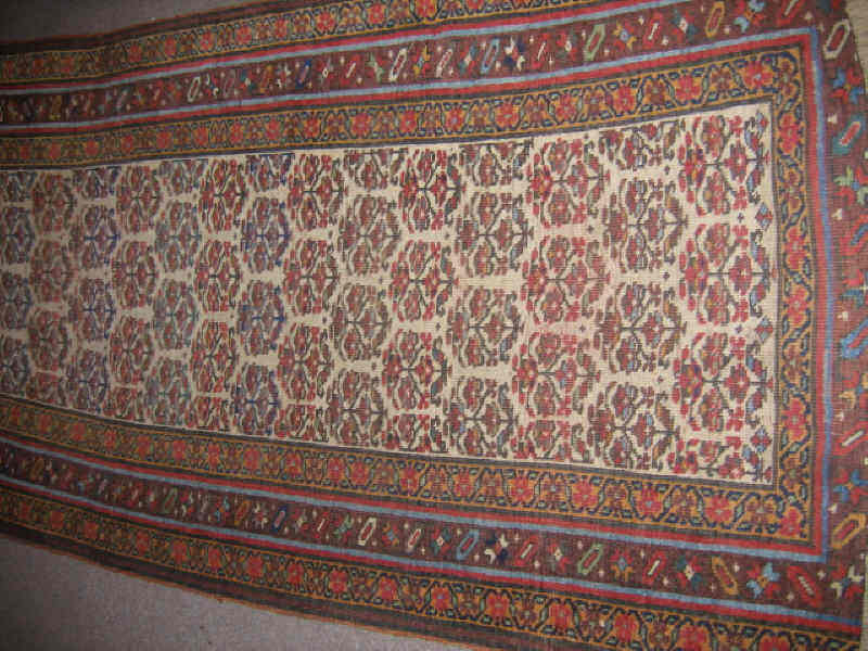 Appraisal: KURDISH BIJAR LONG RUG The ivory field shows an allover