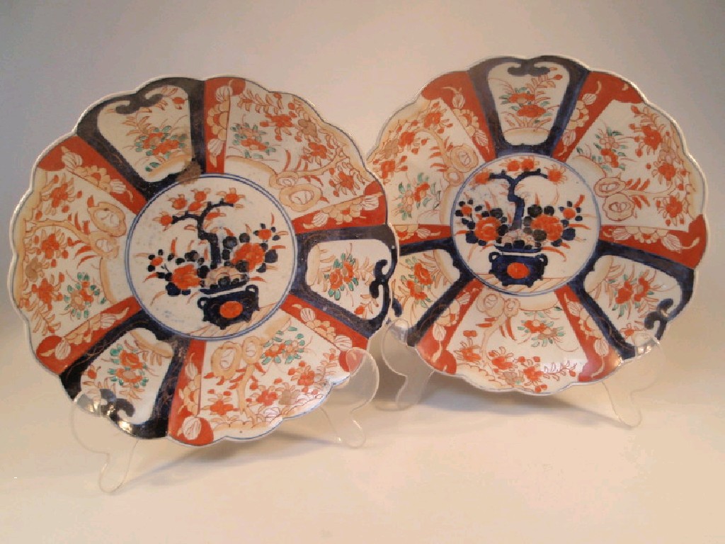 Appraisal: Two Japanese Imari chargers each with waved rims and painted