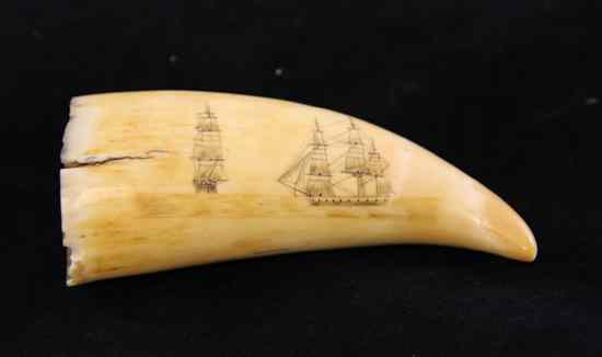 Appraisal: A th century whale tooth scrimshaw carved with two views