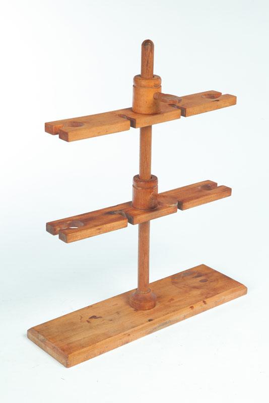 Appraisal: SHAKER BOTTLE FILL STAND American th century maple Adjustable rack