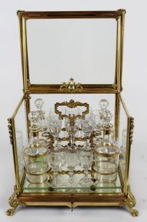 Appraisal: French gilt bronze glass tantalus set French late th century