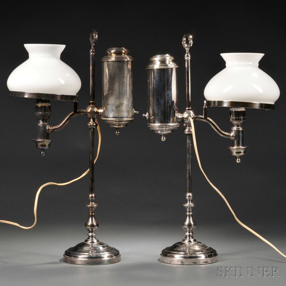 Appraisal: Pair of Silver-plated Student Lamps late th century with white