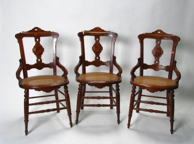 Appraisal: Set of Three Walnut Victorian Hip Rest Chairs with caned