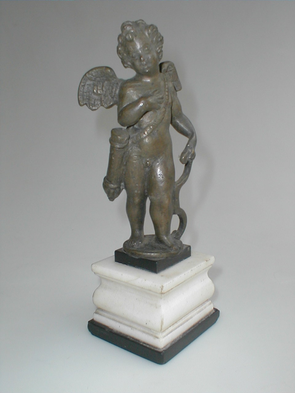 Appraisal: After Niccolo Roccatagliata fl - A bronze figure of Cupid