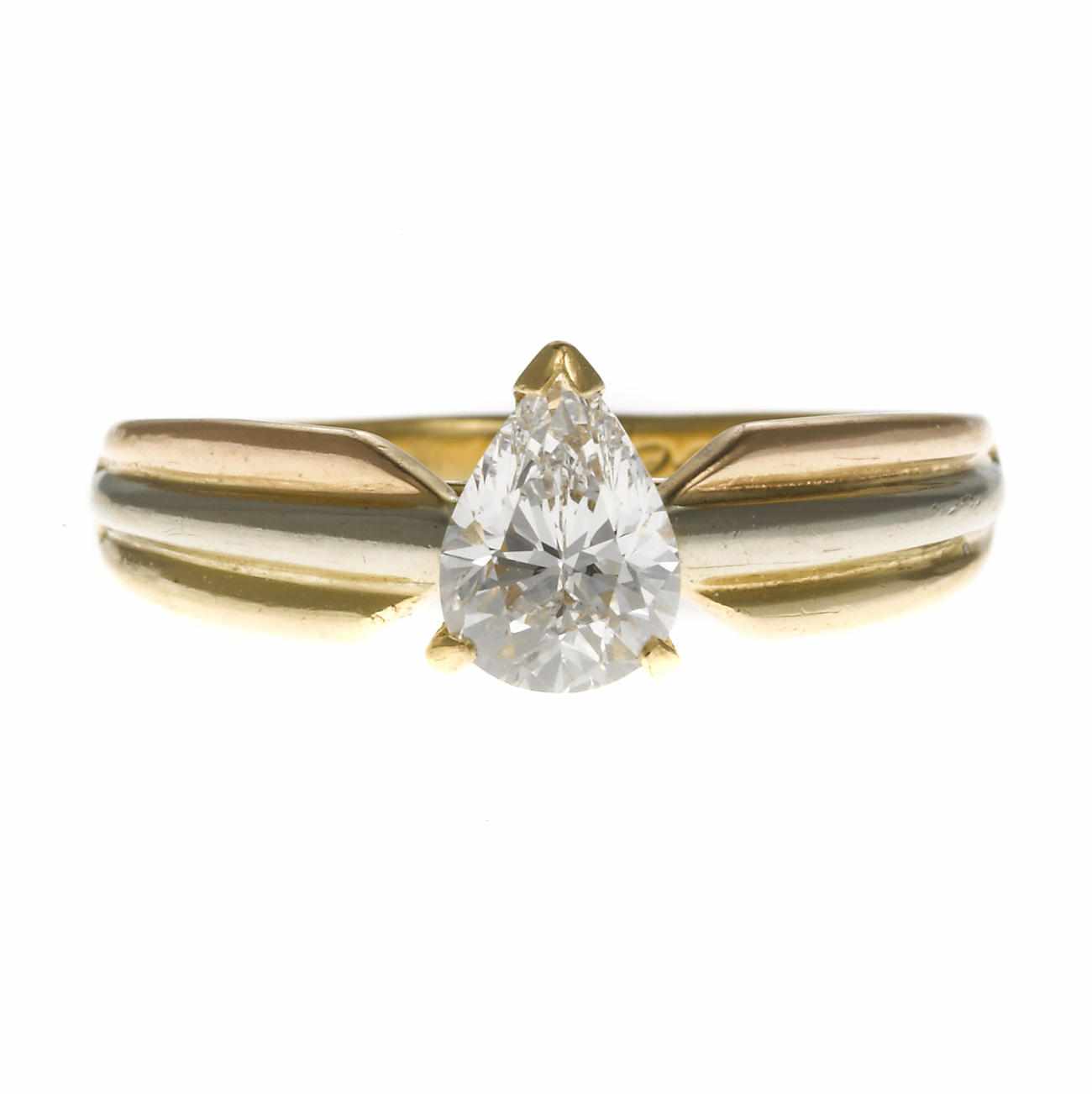 Appraisal: A diamond solitaire ring Cartier French the pear-shaped diamond weighing