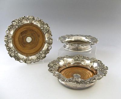 Appraisal: A pair of late old Sheffield plated wine coasters circular