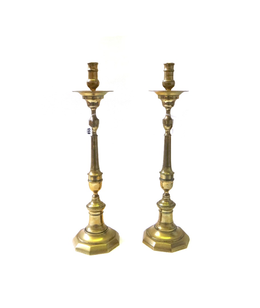 Appraisal: A pair of Victorian brass altar candlesticks each of turned