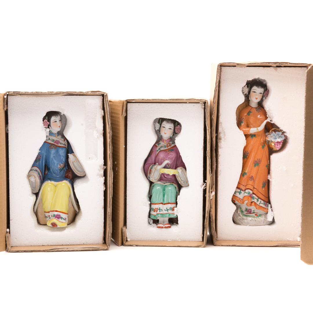 Appraisal: Three Chinese Export porcelain maiden figures in H in original