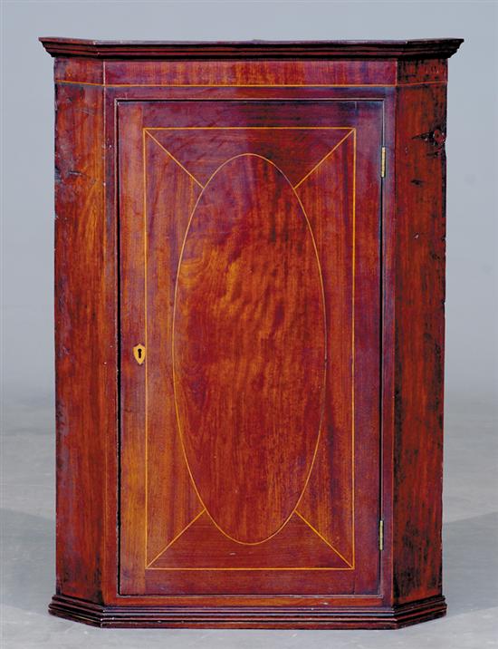 Appraisal: English inlaid mahogany hanging wall cabinet early th century molded