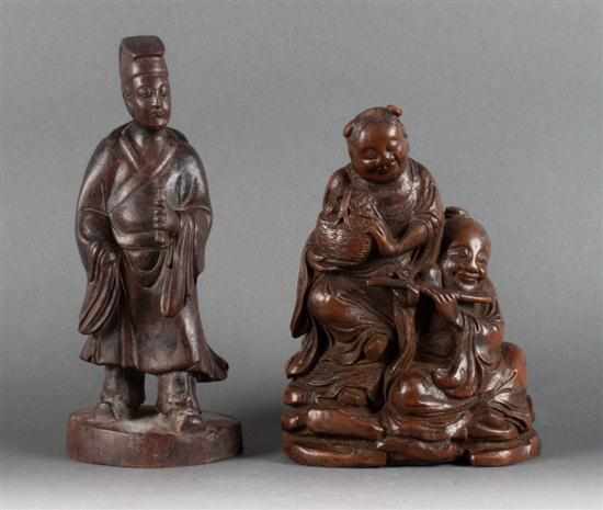 Appraisal: Chinese carved fruitwood figure of a scholar and a bamboo-root