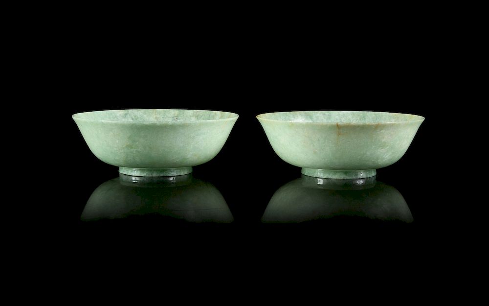 Appraisal: A Pair of Mottled Apple Green Jadeite Bowls Each height