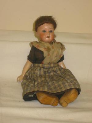 Appraisal: An Armand Marseille bisque head girl doll with blue glass