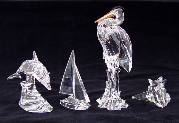 Appraisal: SWAROVSKI DOLPHIN SAILBOAT SEASHELL HERON piece lot to include Heron