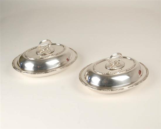 Appraisal: A Pair of English Silverplated Covered Vegetable Dishes marked H