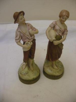 Appraisal: A PAIR OF ROYAL DUX PORCELAIN FIGURES modelled as water