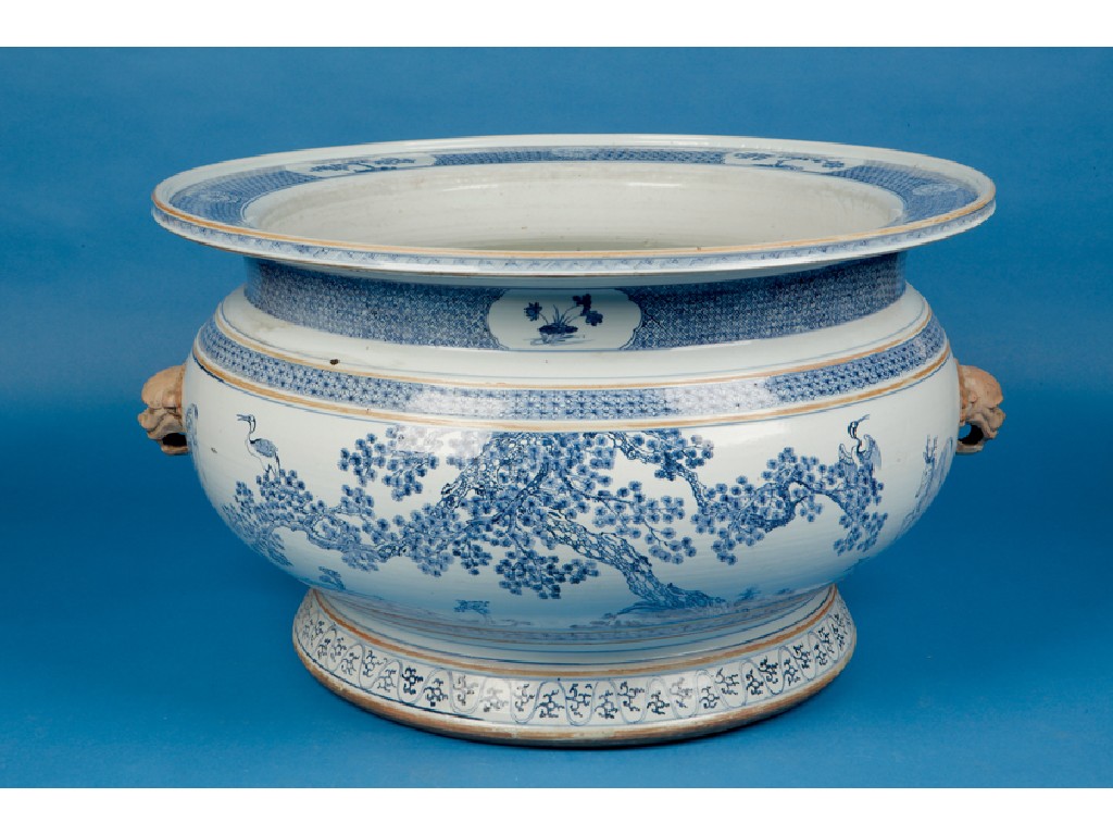 Appraisal: A CHINESE BLUE AND WHITE CISTERN of massive proportions decorated