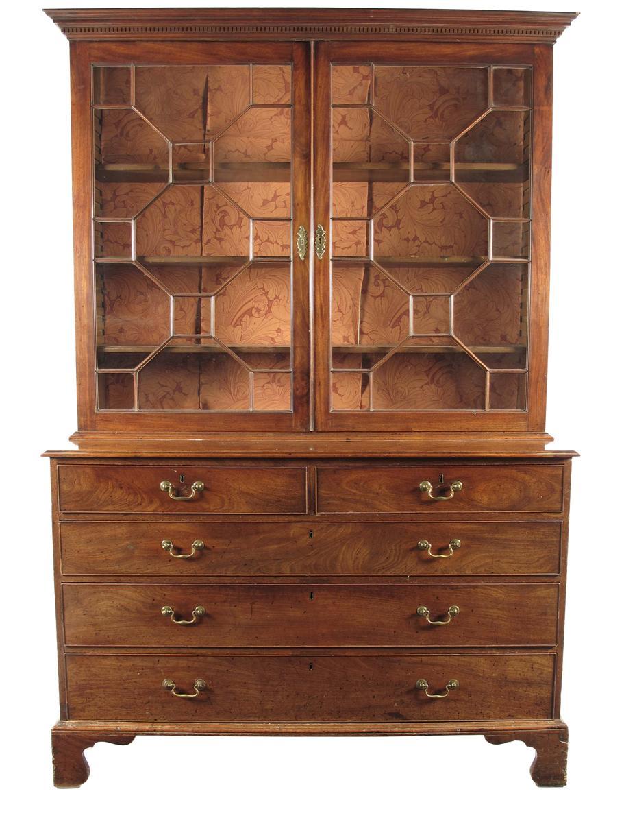 Appraisal: A George III mahogany bookcase on chest