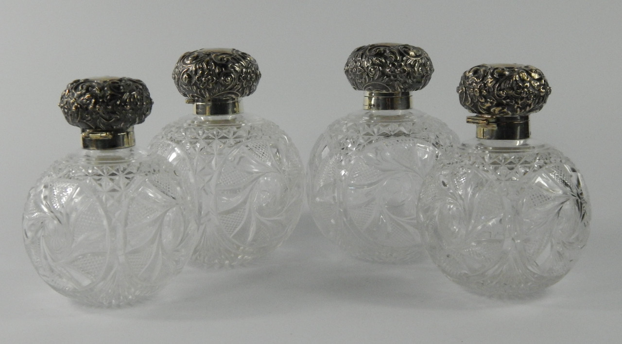 Appraisal: A set of four late Victorian cut glass and silver