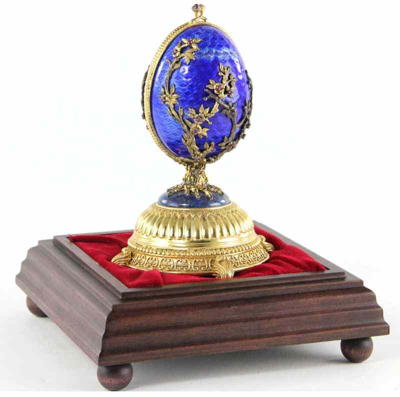 Appraisal: Faberge Firebird Eggcobalt guilloche enameled egg with gilt silver mounts