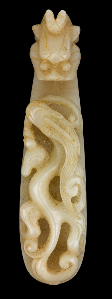 Appraisal: Chinese celadon jade garment hook th century