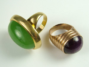 Appraisal: A gold and green hardstone set dress ring size 'O'