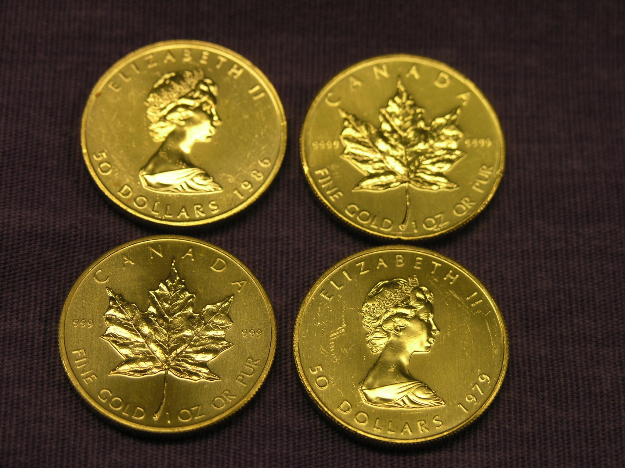 Appraisal: Four Canadian Dollars gold coins