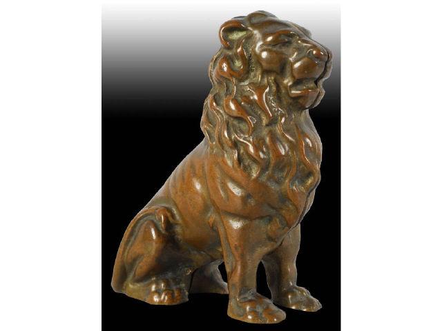 Appraisal: Cast Iron Seated Royal Lion Still Bank Description Made by