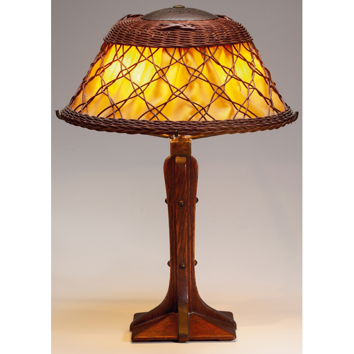 Appraisal: Arts and Crafts lamp contemporary wooden base supporting a wicker