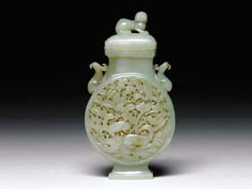 Appraisal: OPENWORK CARVED JADE VASE Chinese celadon jade covered vase of