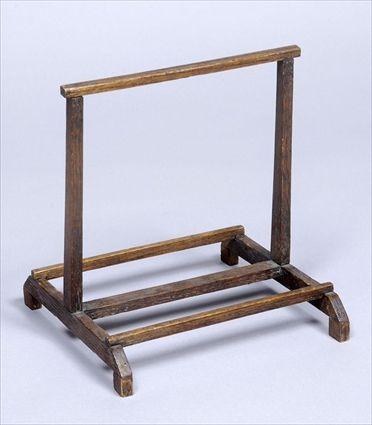 Appraisal: OAK DOUBLE-SIDED PICTURE STAND The u-shaped frame on trestle supports