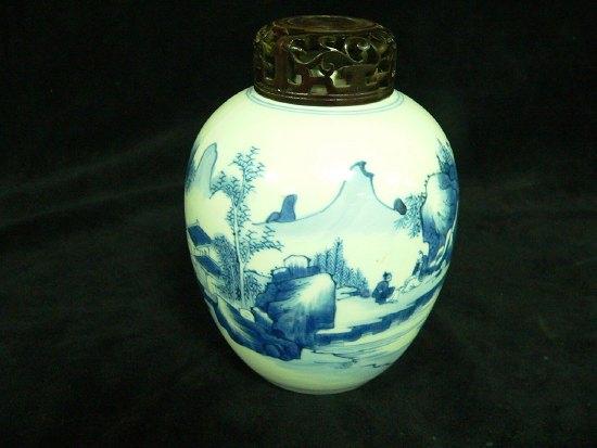 Appraisal: A K'ang Hsi blue and white ginger jar painted buildings