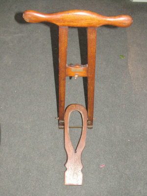 Appraisal: A brass mounted mahogany boot-jack by Maxwell Co Dover St