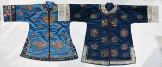 Appraisal: Two Chinese Blue Robes lot of Chinese embroidered blue ground