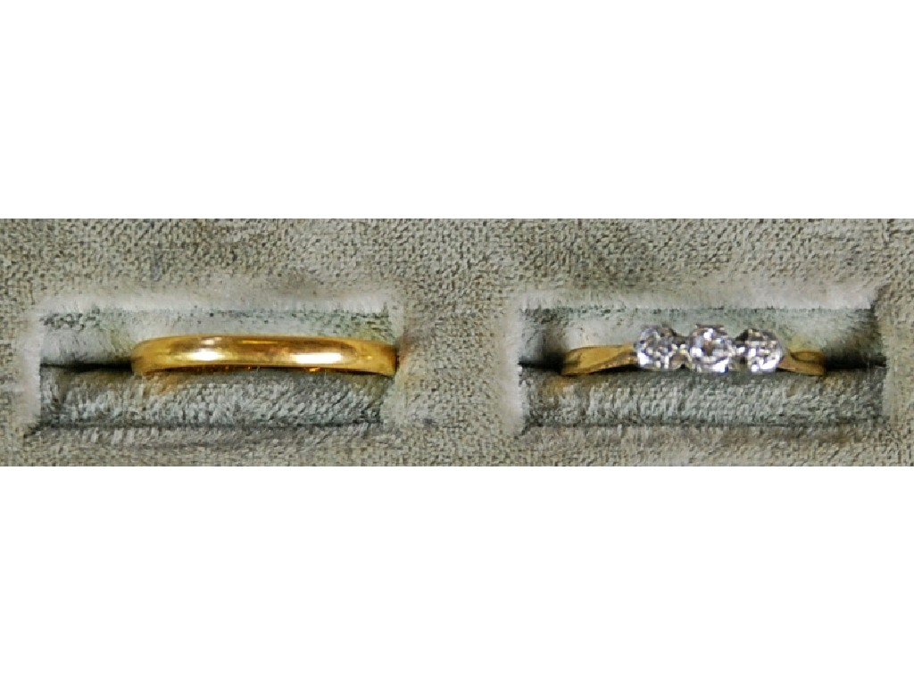 Appraisal: ct GOLD WEDDING RING and a RING WITH THREE TINY