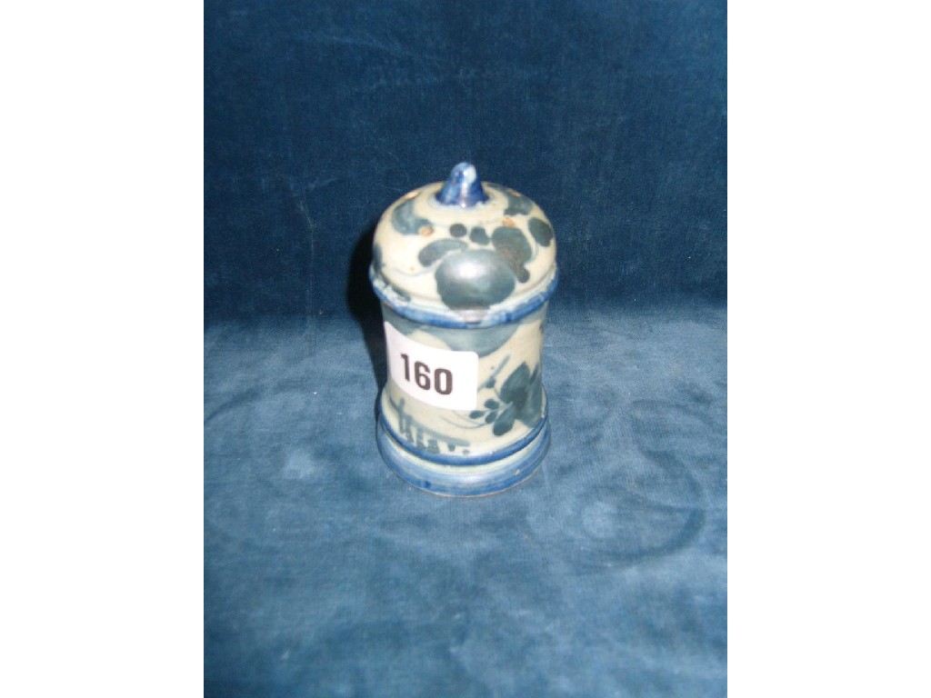 Appraisal: A tin glazed earthenware pounce pot of cylindrical form with