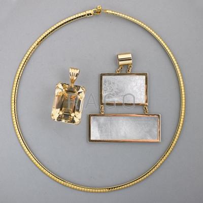 Appraisal: TWO LARGE GOLD PENDANTS th C Emerald cut citrine pendant