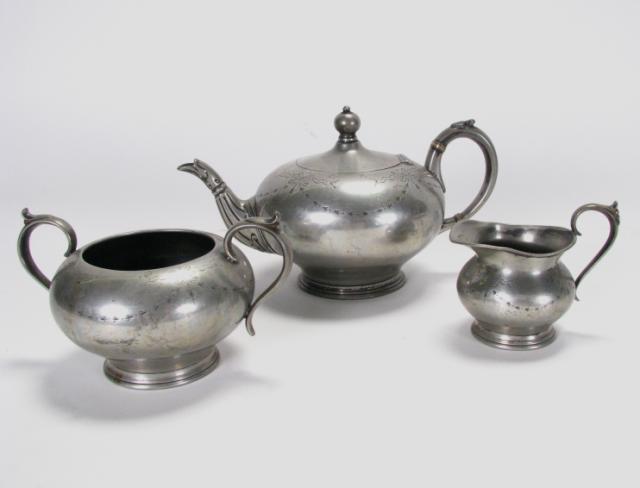 Appraisal: Three piece hand-chased silverplate English Sheffield tea set with bugle