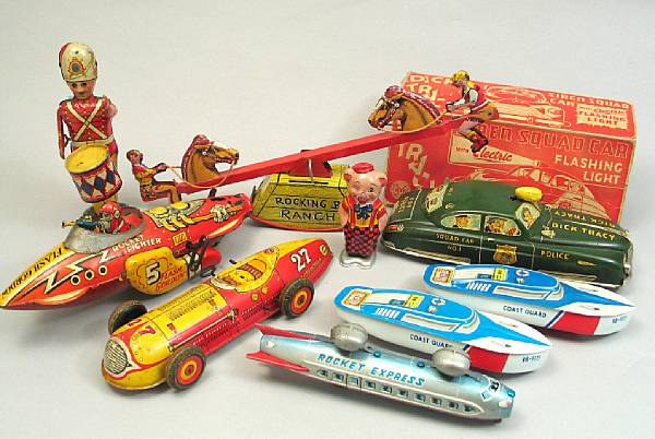 Appraisal: A collection of nine American wind-up lithographed tin toys s