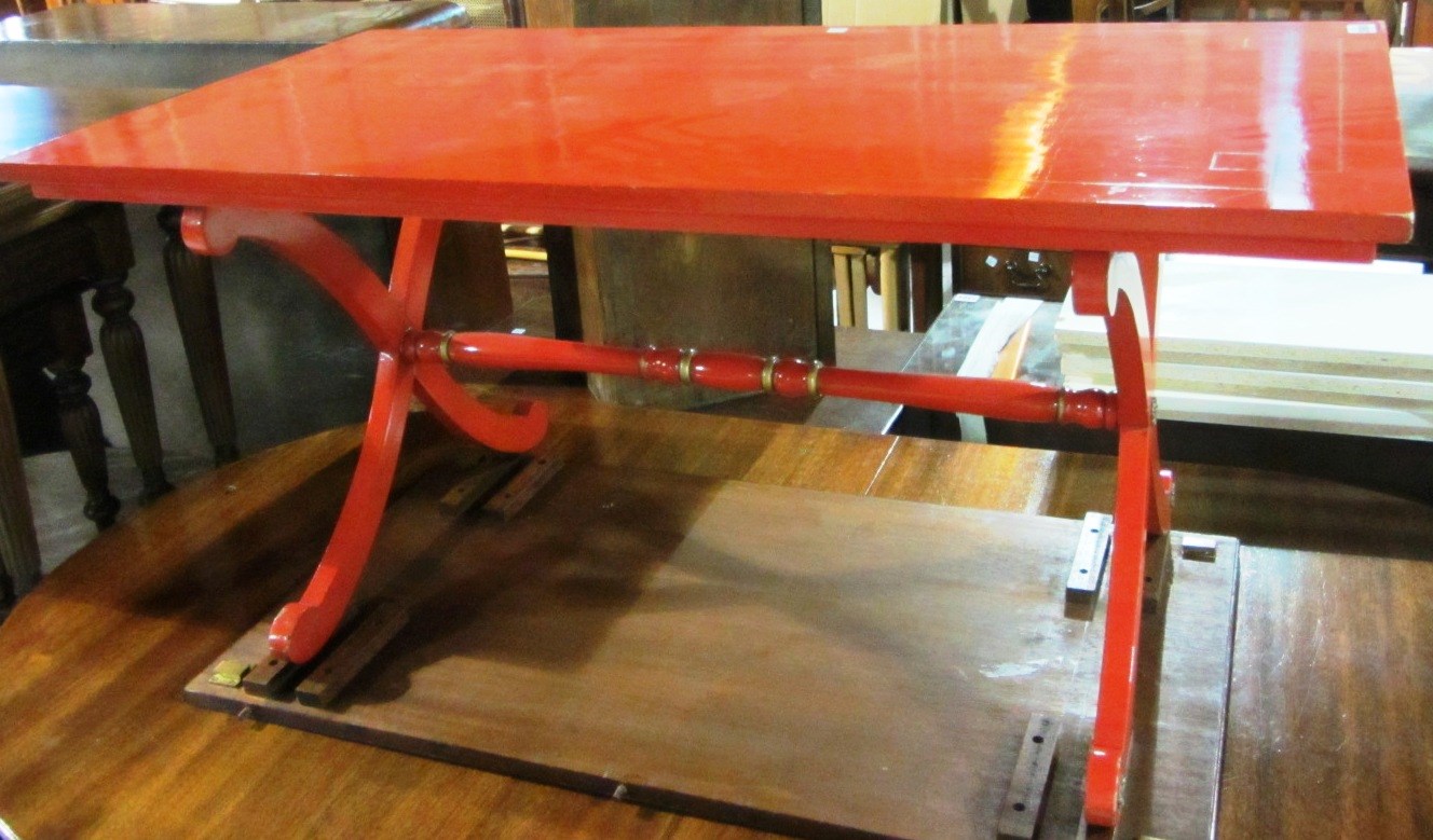 Appraisal: A th century red painted rectangular coffee table