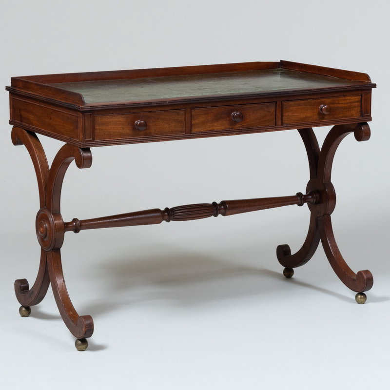 Appraisal: Regency Style Mahogany Writing Table With leather inset top On