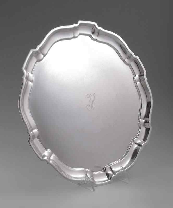 Appraisal: LARGE POOLE CHIPPENDALE STERLING PLATTER Marked Sterling by Poole Chippendale