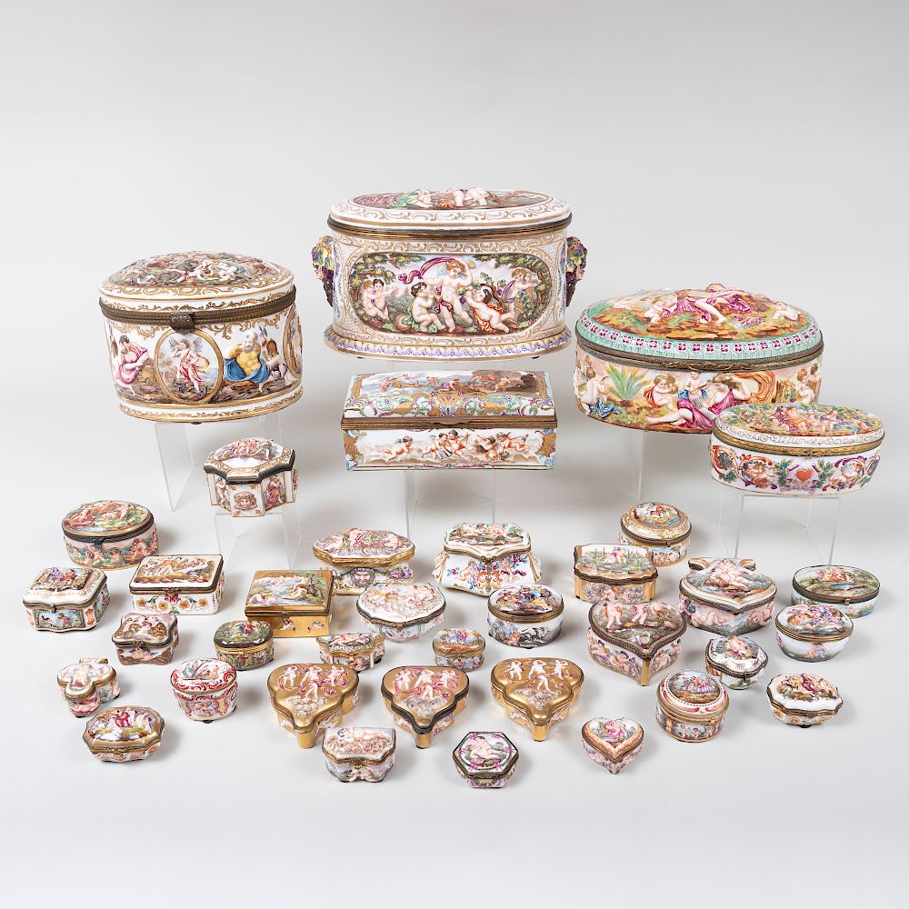 Appraisal: Group of Thirty-Four Capodimonte Porcelain Boxes Most with blue crowned