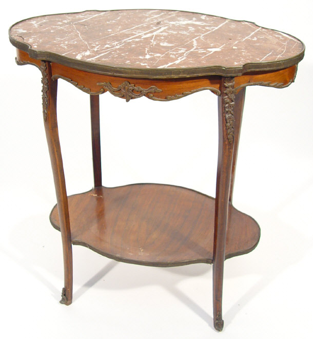 Appraisal: French design shaped oval walnut side table with white veined