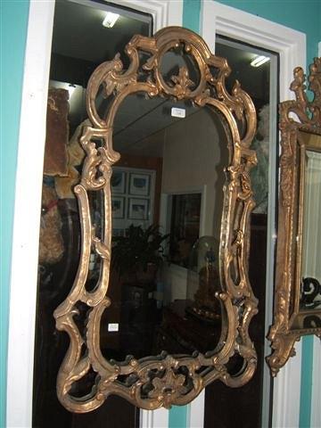 Appraisal: A gilt George III style hanging wall mirror high