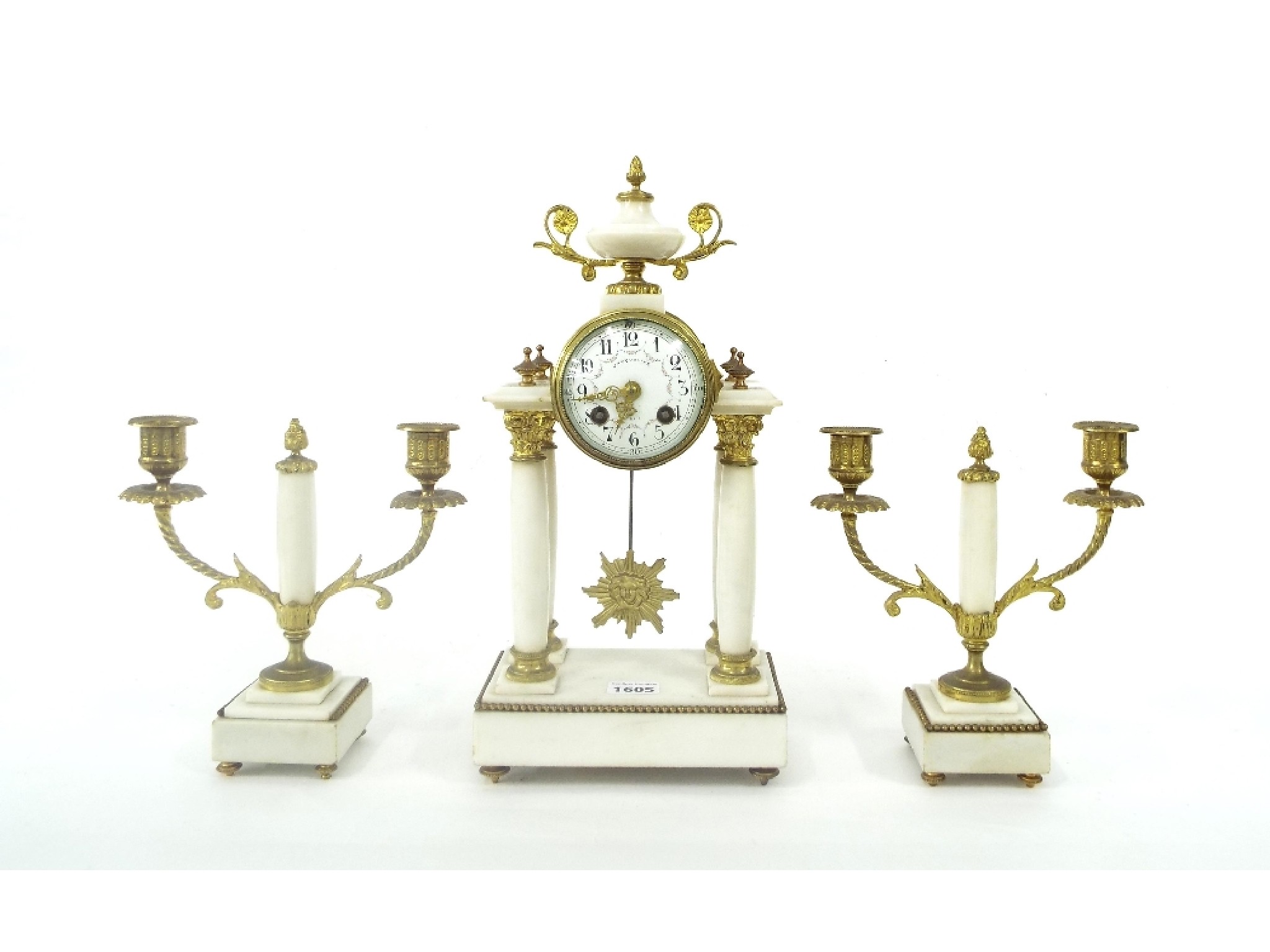 Appraisal: White marble portico two train mantel clock garniture the movement