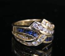 Appraisal: Diamond and Sapphire Ring Kt yellow gold ring channel set