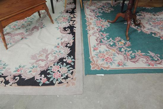 Appraisal: TWO ROOM SIZED HOOKED RUGS One cream ground the other