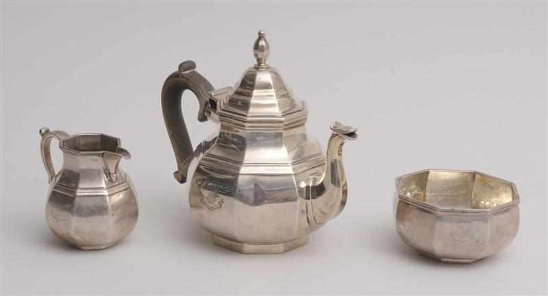 Appraisal: ENGLISH CRESTED SILVER THREE-PIECE MORNING TEA SET Heming Co London