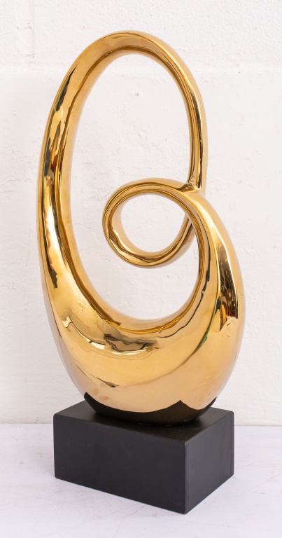 Appraisal: GOLDTONE ABSTRACT SCULPTURE Goldtone abstract sculpture H including base