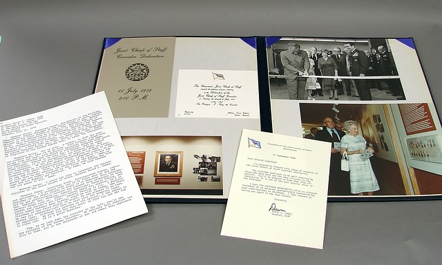 Appraisal: Presentation folder displaying photographs and related ephemera regarding the Joint